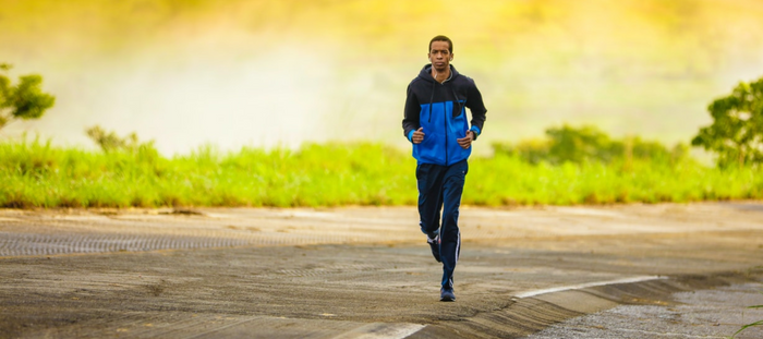 woman running on road