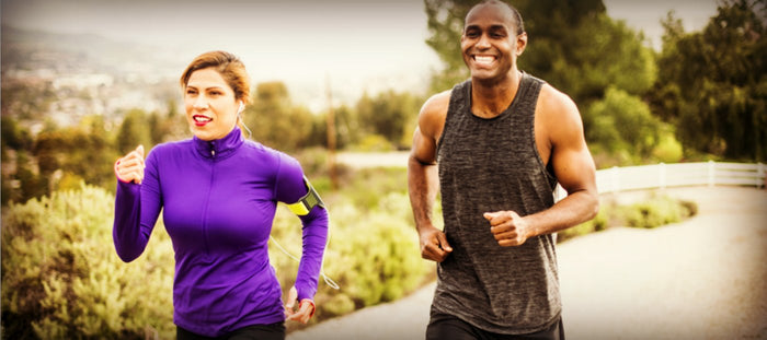 couple running on mountain road