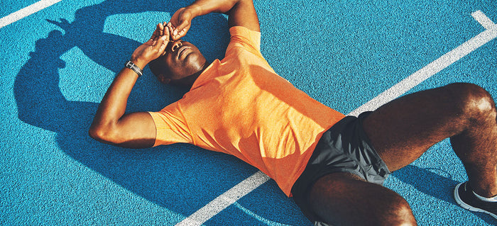 runner resting on ground