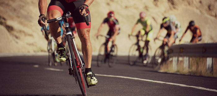 cyclist racing uphill