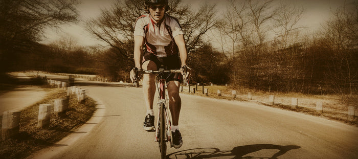 front view of cyclist on open road