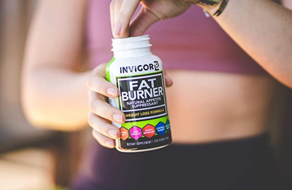 woman taking invigor8 fat burner
