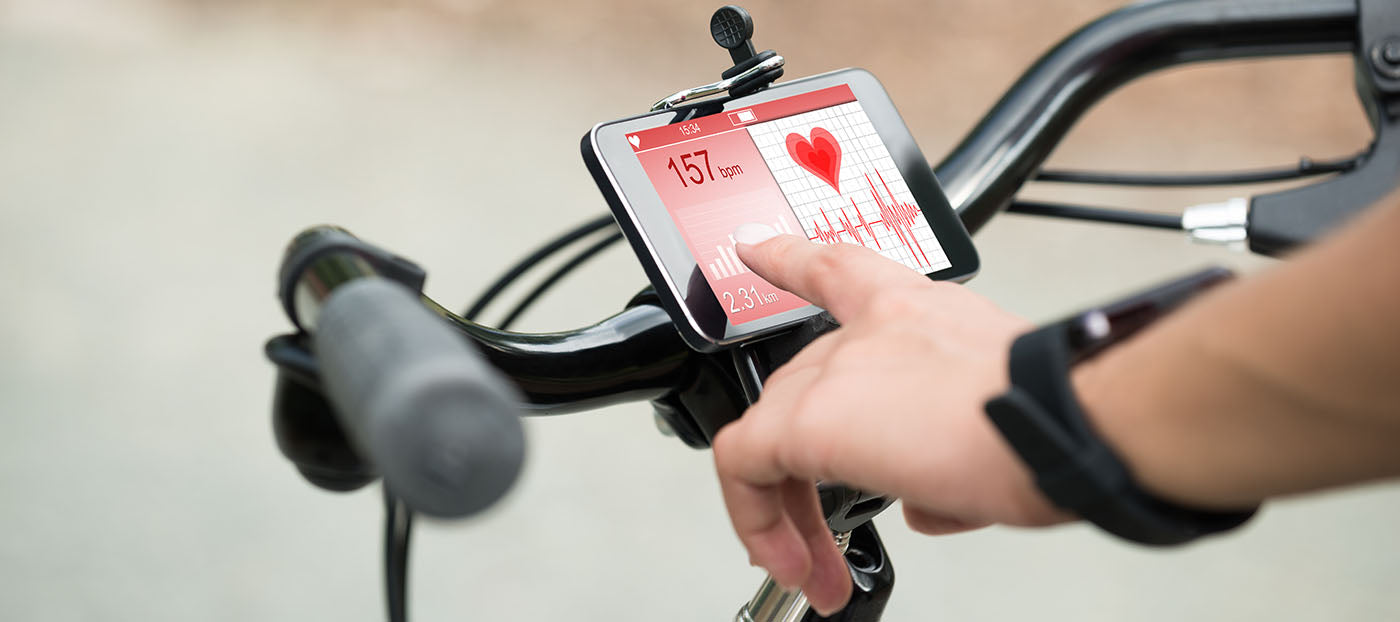 cyclist checking heart rate