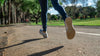 a shot of a woman's feet in stride