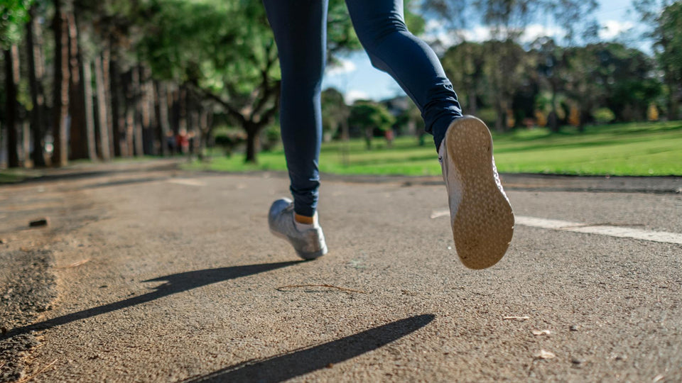 a shot of a woman's feet in stride