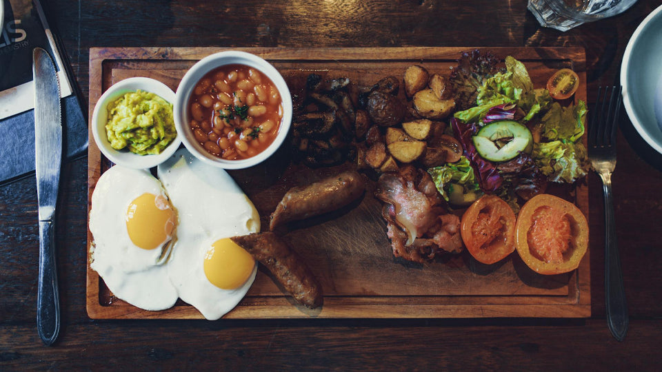 img of a spread of food on a cutting board including proteins, starches, and fiber